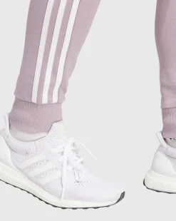 Adidas Pantaloni Essentials 3-Stripes French Terry Cuffed Rosa Donna