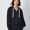 Felpa cropped con cappuccio e cerniera, lavaggio vintage Nero Donna